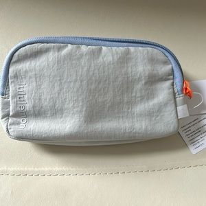 New with price tags, lululemon mini belt bag, vapor color gray lilac orange